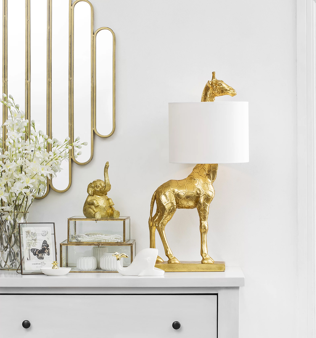 http://www.home-designing.com/product-of-the-week-a-cute-golden-giraffe-lamp