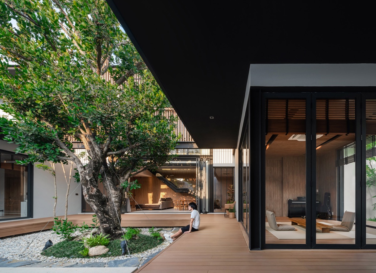 Casa moderna tranquilamente zen en Tailandia con patios y piscina